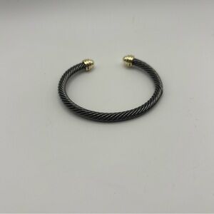 Elegant Black and Gold Twisted Bracelet